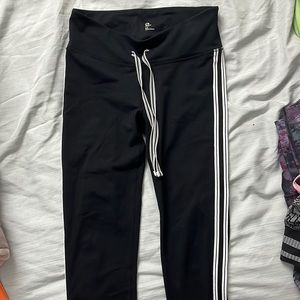 GapFit Leggings, Size XS, Color Black with White stripes down the sides.